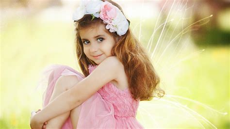 Beautiful Cute Little Girl Is Sitting In Blur Green Background Wearing Pink Dress HD Cute ...