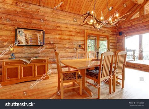Each piece can be crafted from rough cut timber that gives the maximum rustic feel or from planed boards that appear more finished and refined. Log Cabin Dining Room Interior With Custom Furniture ...