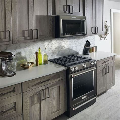 The quality of these black stainless steel kitchen cabinets is highly regulated by ensuring that all recommended standards in terms of measurements their drawers are super fine, offering users easy storage to speed up and increase cooking efficiency. 50 Beautiful Black Stainless Steel Kitchen Ideas ...
