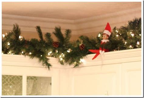 4.3 out of 5 stars. Garland and lights on top of the kitchen cabinets | Christmas decorations, Decorating above ...