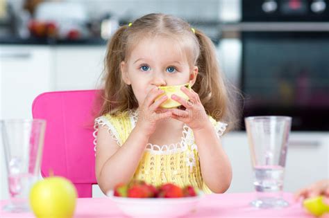Kid Eating Healthy Food At Home Stock Image Image Of Drinking