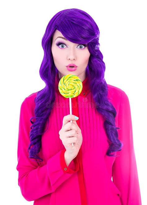 Portrait Of Surprised Woman With Purple Hair Wig Holding Colorful