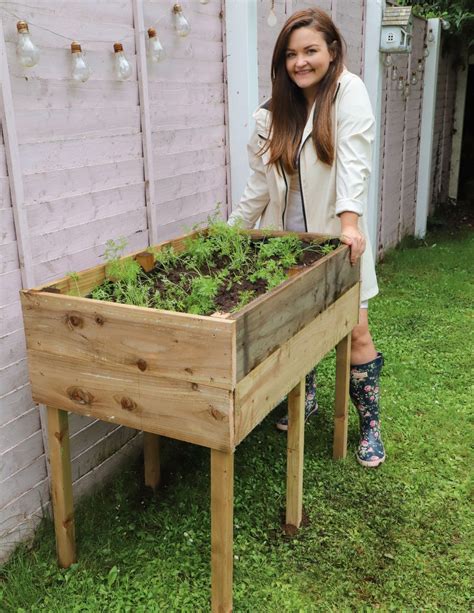 How to make a raised garden bed with legs! - Dainty Dress ...