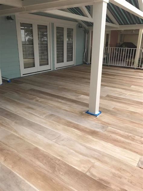 Patio deck floor covering engineered to be easy to install, you can quickly nail them or glue them down over plywood, concrete subfloor, plywood consider the versatile. Concrete floor stained to look like a wood floor! I love ...