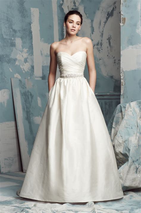 The skirt was just a silk satin with a few pleats near the waist and it had pockets. @palomablancawed Silk Dupioni Wedding Dress. Strapless ...