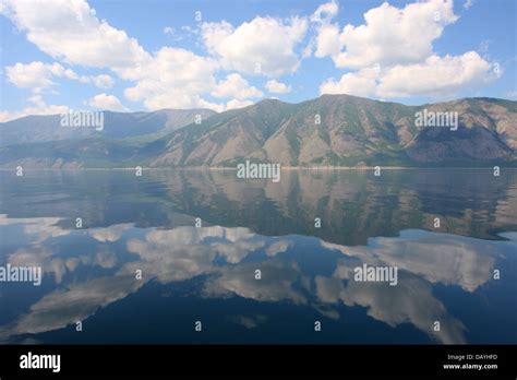 Lake Baikal And Mountains Of Siberia With Beautiful Sky And Clouds