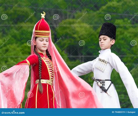 Adyghe Girl And Boy In National Costume On The Circassian Ethnic