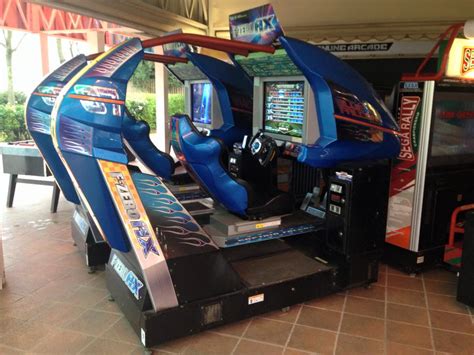 2 F Zero Ax Cabs With A Sega Rally Championship Cab To Their Right