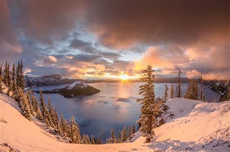 Sunrise Over Snow Covered Crater Lake National Park In Oregon Greg
