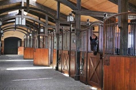 Everyone likes a pretty horse stable. Classic old style stalls | Dream horse barns, Beautiful ...