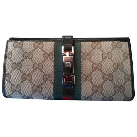 Vintage gucci business/credit card holder, trifold design. Vintage Gucci Wallet with clasp For Sale at 1stdibs