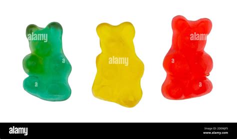 Side View Of Three Colorful Gummi Bear Sugar Candies Isolated On A