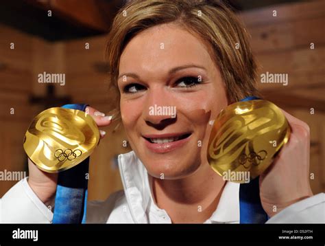 Maria Riesch Of Germany Poses With Her Two Gold Medals For The Womens