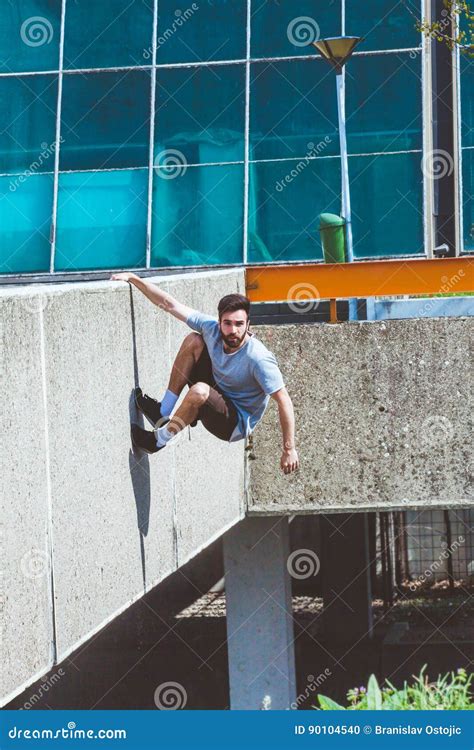 Young Man Doing Parkour In The City Stock Photo Image Of Athletic