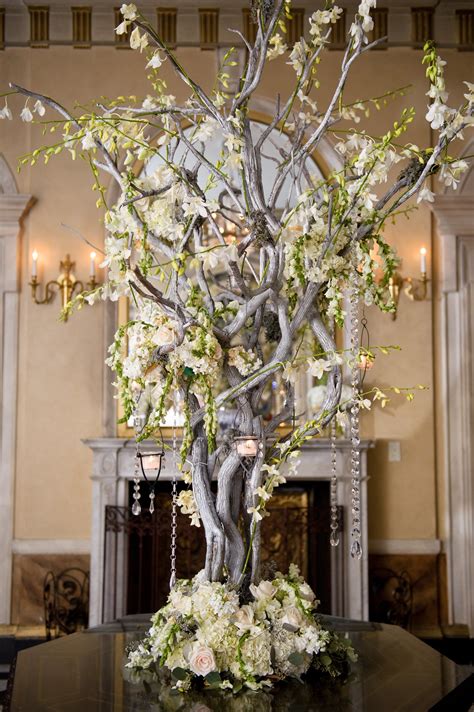 A Tall Arrangement Of Manzanita Branches Dripping With White Blooms