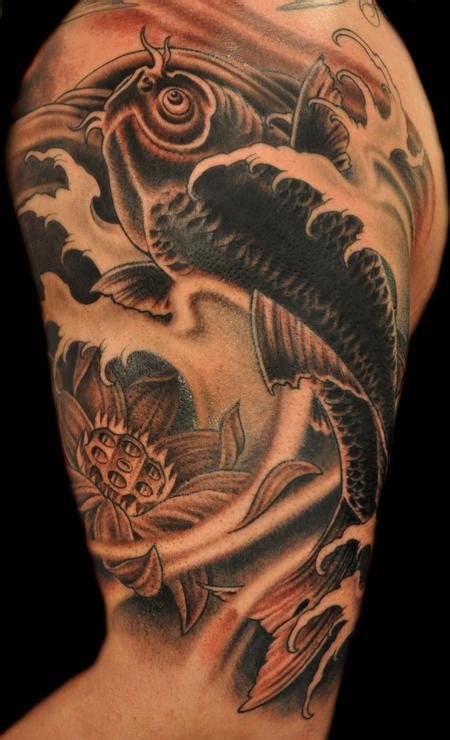 Koi fish tattoos have evolved with trends like watercolors, western motifs and realistic renditions. Black and Gray Koi Fish Tattoo : Tattoos