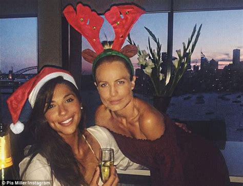 Pia Miller Shows Off Her Legs In Christmas Snap As She Poses With A