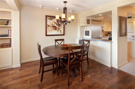 The simple line furniture maintains unity with the rest of the decoration thanks to the sand tones used. Polo Retreat Dining Room with Pass Through Kitchen ...