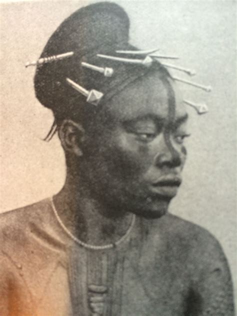 A Woman With Scarification And Painted Facial Patterns The Congo