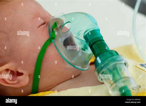 Baby With Oxygen Mask In Hospital Stock Photo Alamy