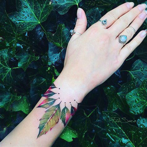 Check out our nature tattoos selection for the very best in unique or custom, handmade pieces from our tattooing shops. Delicate Nature Watercolor Tattoos by Pis Saro