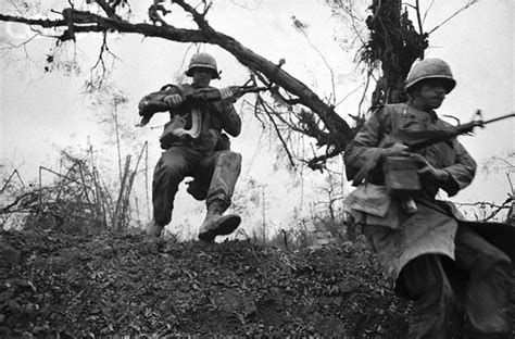 Members Of The 3rd Brigade First Air Cavalry Jump Into A Ditch After