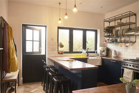 Get the flooring you want! Blue Shaker style kitchen with Copper worktops and handles ...