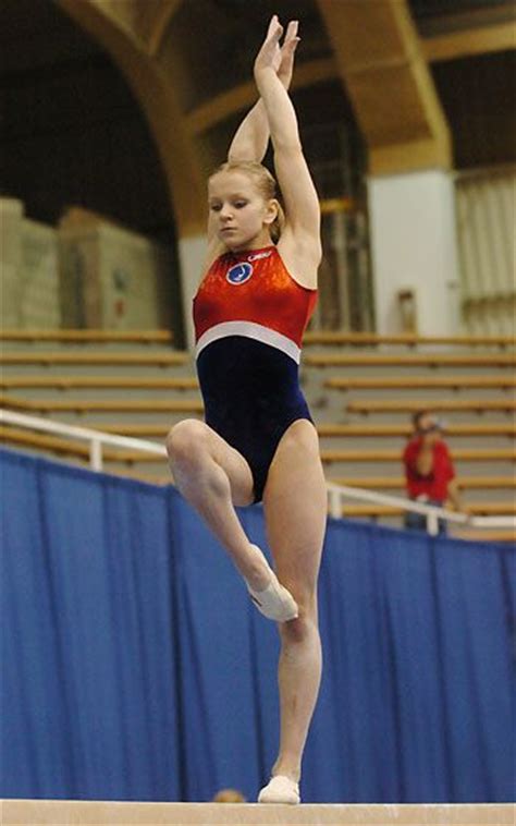 High Straight Twisted Arms Passe Stand Gymnastics Poses Gymnastics