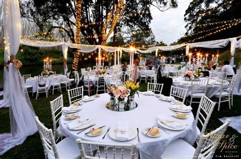 Fairy light spheres can be made from grapevines such as in this tutorial, or fencing wire wrapped around an inflated beach ball, video below A 'Fairy Light Wonderland' Garden Wedding - Modern Wedding