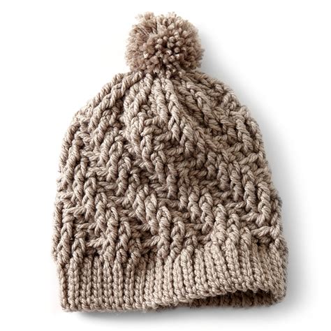 This free hat pattern produces a warm, cushy fabric that knits up quick. Bernat Stepping Texture Hat | Yarnspirations