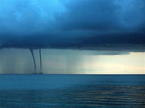 A channel through which water is discharged, especially from the gutters of a roof. What are waterspouts? - Quora