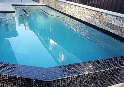 Luxurious ceramic tile designs that are inspired by agate stone bring unique patterns and classy gray, soft black and white colors into modern interior decorating. Urban Black Ashlar Pattern Ceramic Mosaic Pool Tiles CMC475