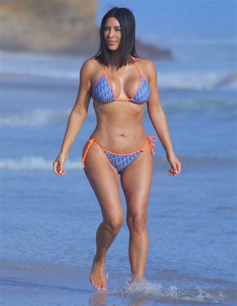 kim kardashian west s curves strike again in another vintage dior bikini