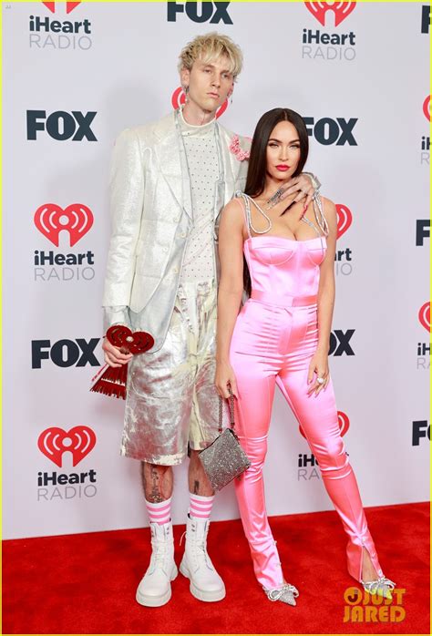 Megan Fox Wows In Pink Bodysuit While Supporting Machine Gun Kelly At IHeartRadio Awards