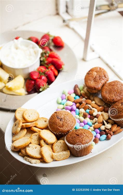 Assortment Of Snacks Served On White Platters Stock Photo Image Of