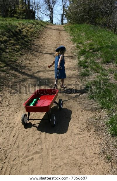 Girl Pulling Wagon Stock Photo Edit Now 7366687