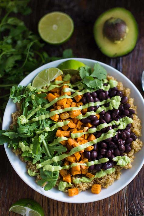 A mix of quinoa, cucumbers or kale or spinach, feta cheese, kalamata olives, and pepperoncini! Southwestern Inspired Quinoa Bowl | Food with Feeling