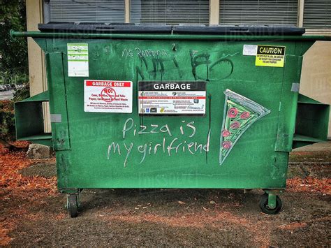 Graffiti On Urban Dumpster Stock Photo Dissolve