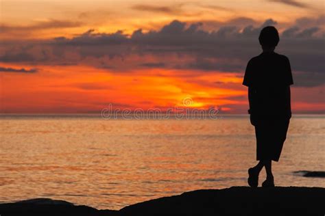 Young Man Stand Up And Look At The Beach Stock Photo Image Of