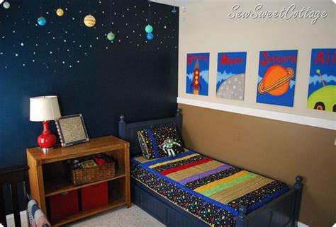 Planets, spaceships, galaxies and stars! outer space room. I like the one dark wall then lighter ...