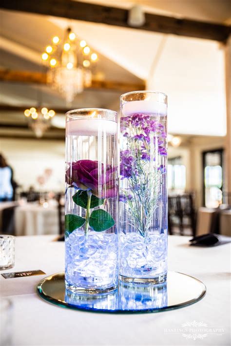 Glass Vase Filled With Water Lights Up Tea Lights Centerpieces