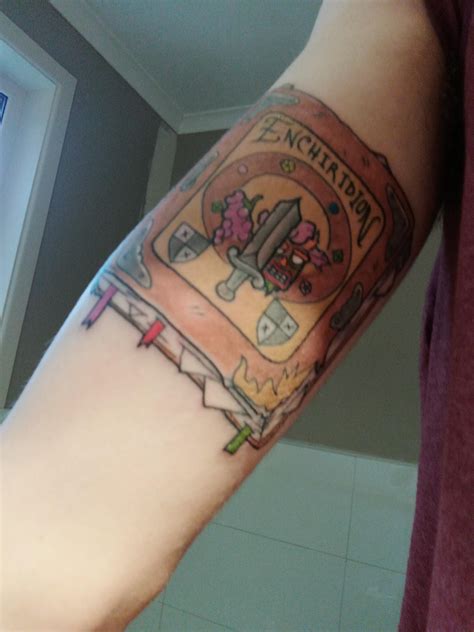 The Enchiridion Tattoo With A Crash Bandicoot Reference In The Mix