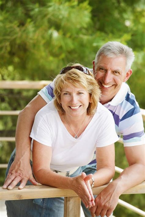 Mature Couple Smiling And Embracing Stock Image Image Of Face