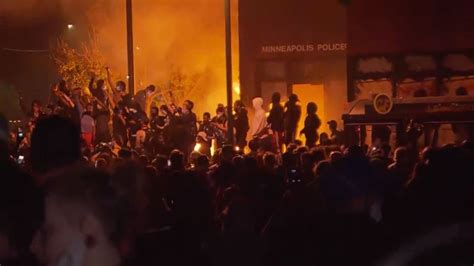 protesters have set a minneapolis police station on fire