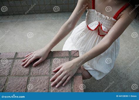 Girl With Hands Touching Tiles Stock Photo Cartoondealer Com