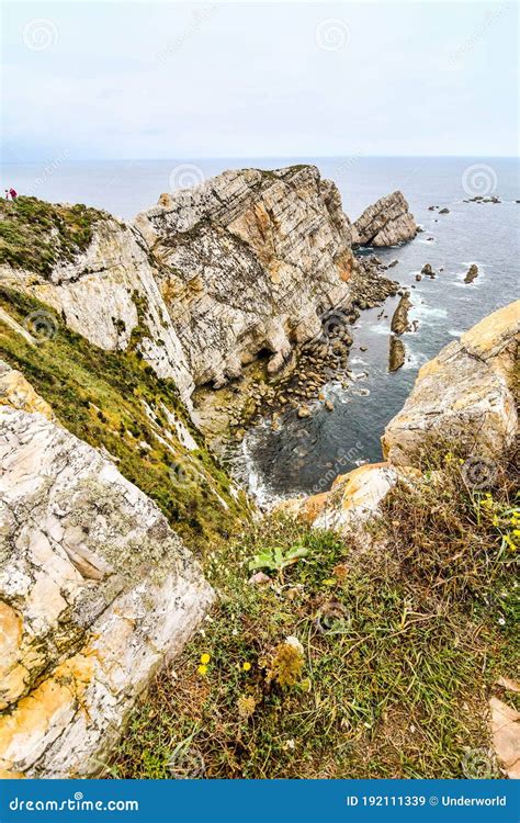 Rocks In The Sea Photo As A Background In Playa Del Silencio