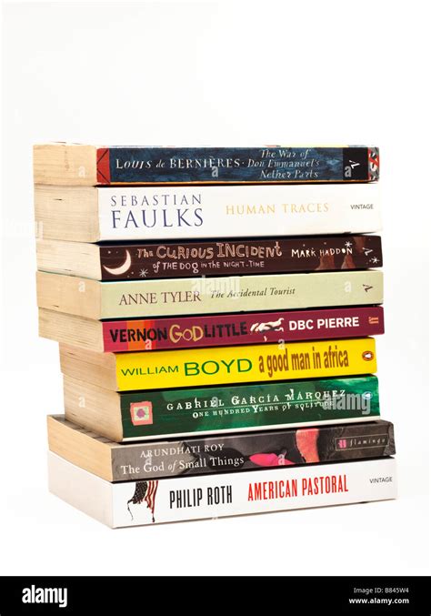 Studio Shot Of Stack Of Book Literary Fiction Novels On White Stock