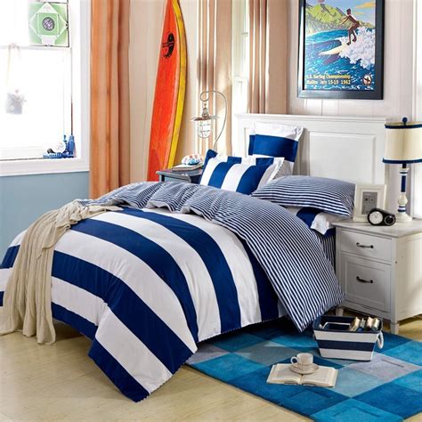 In this setting, the royal navy blue steps in through two elements, a bed cover and a pillow and that's it, a versatile insert with superb aesthetics. Navy Blue and White Boys Rugby Stripe Print Modern Chic ...