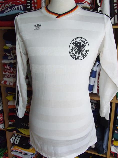 The home kit, away kit, and the third kit, with a different goalkeeper shirt for each kit. Germany Home football shirt 1986 - 1988.