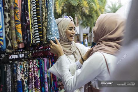 Two Muslim Ladies Shopping For Hijab — Ramadan Smile Stock Photo